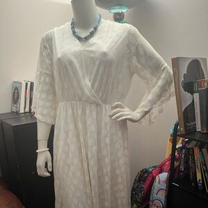 White dress. Sheer w/dots. White undergarment.